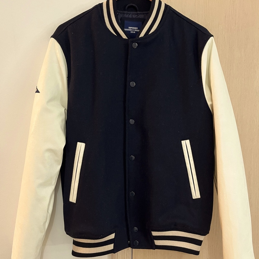Men Youth Self Care Varsity Jacket.